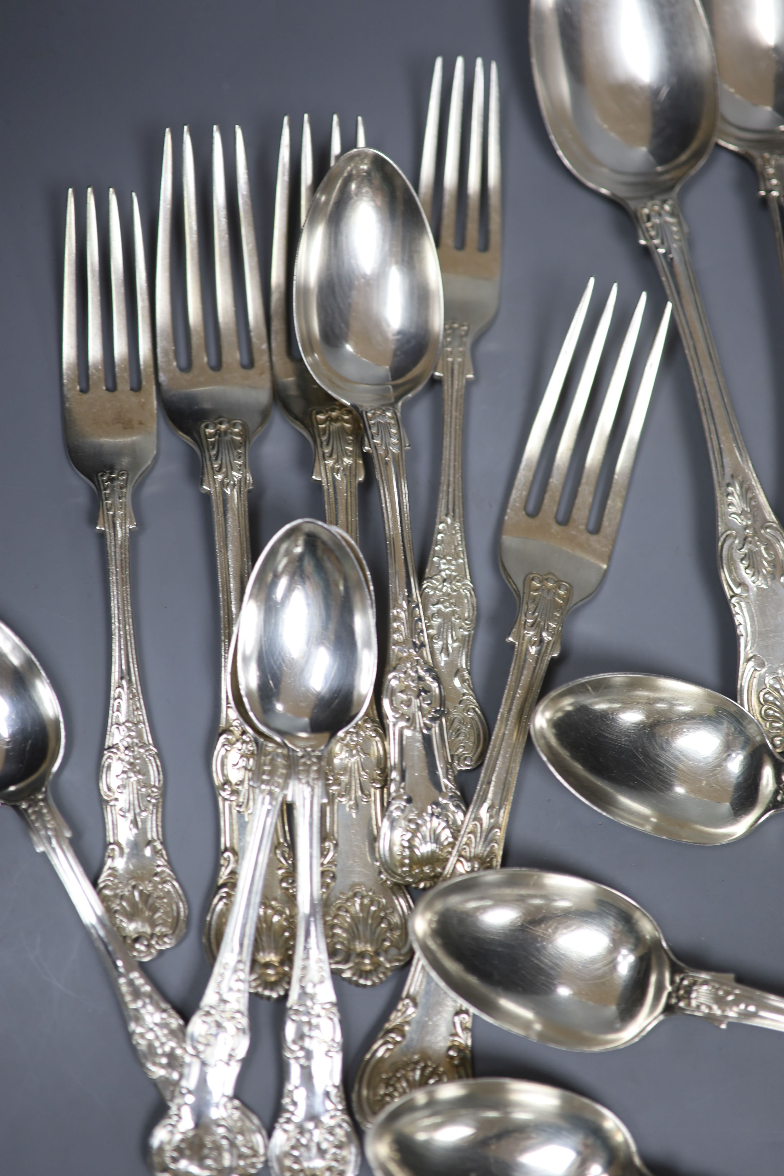 A matched 19th century and later Kings pattern part service of silver flatware, various dates and makers, approx 78oz.